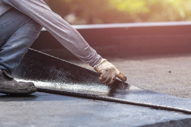 Professional Basement Waterproofing technician working in Beverly, OH